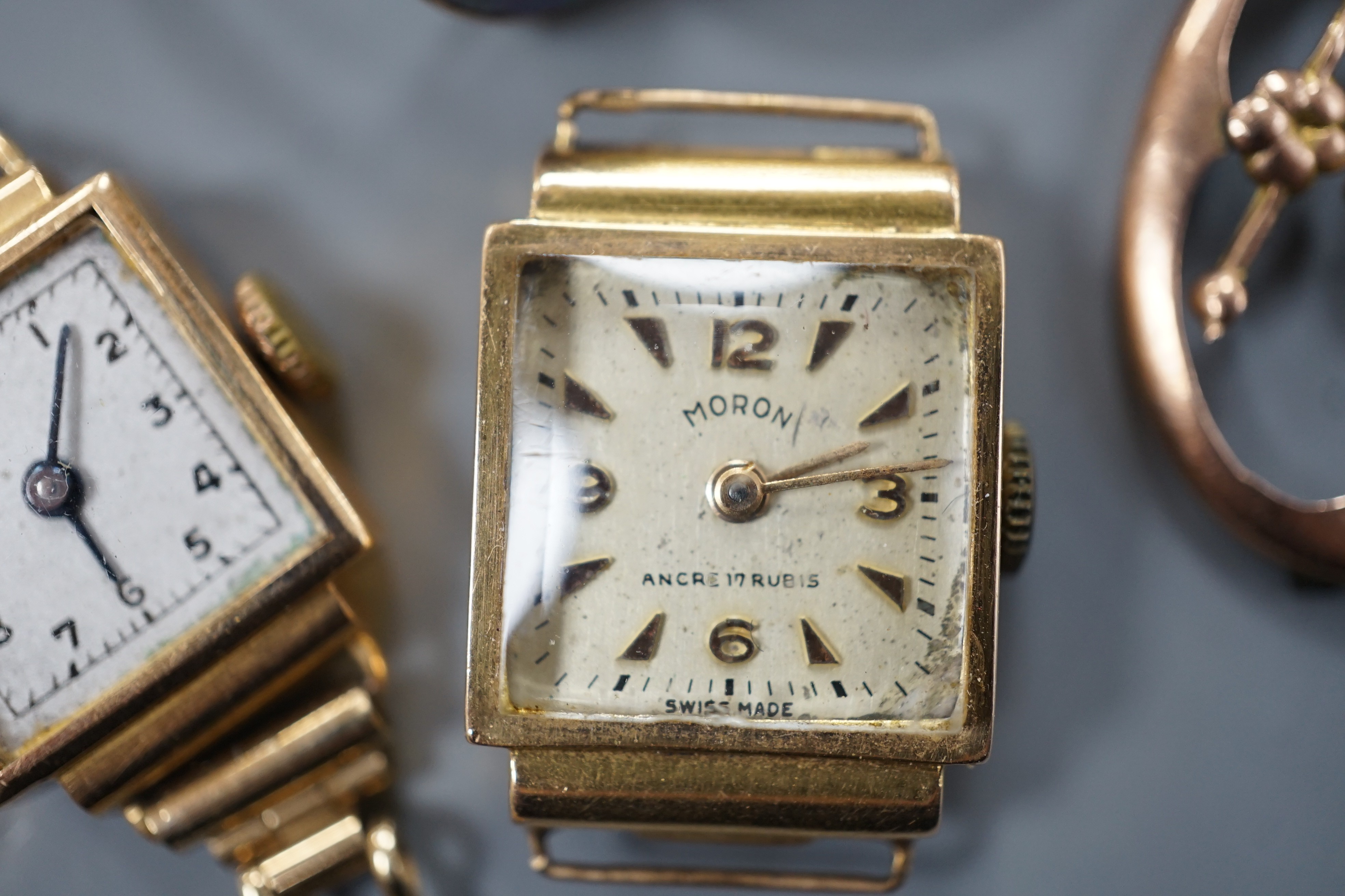 A George V 22ct gold wedding band, size P, 7.3 grams, a 9ct and black opal double set oval ring, a yellow metal pendant frame, a lady's 8k cased manual wind Moron wrist watch(no strap) and another lady's 18k cased manual